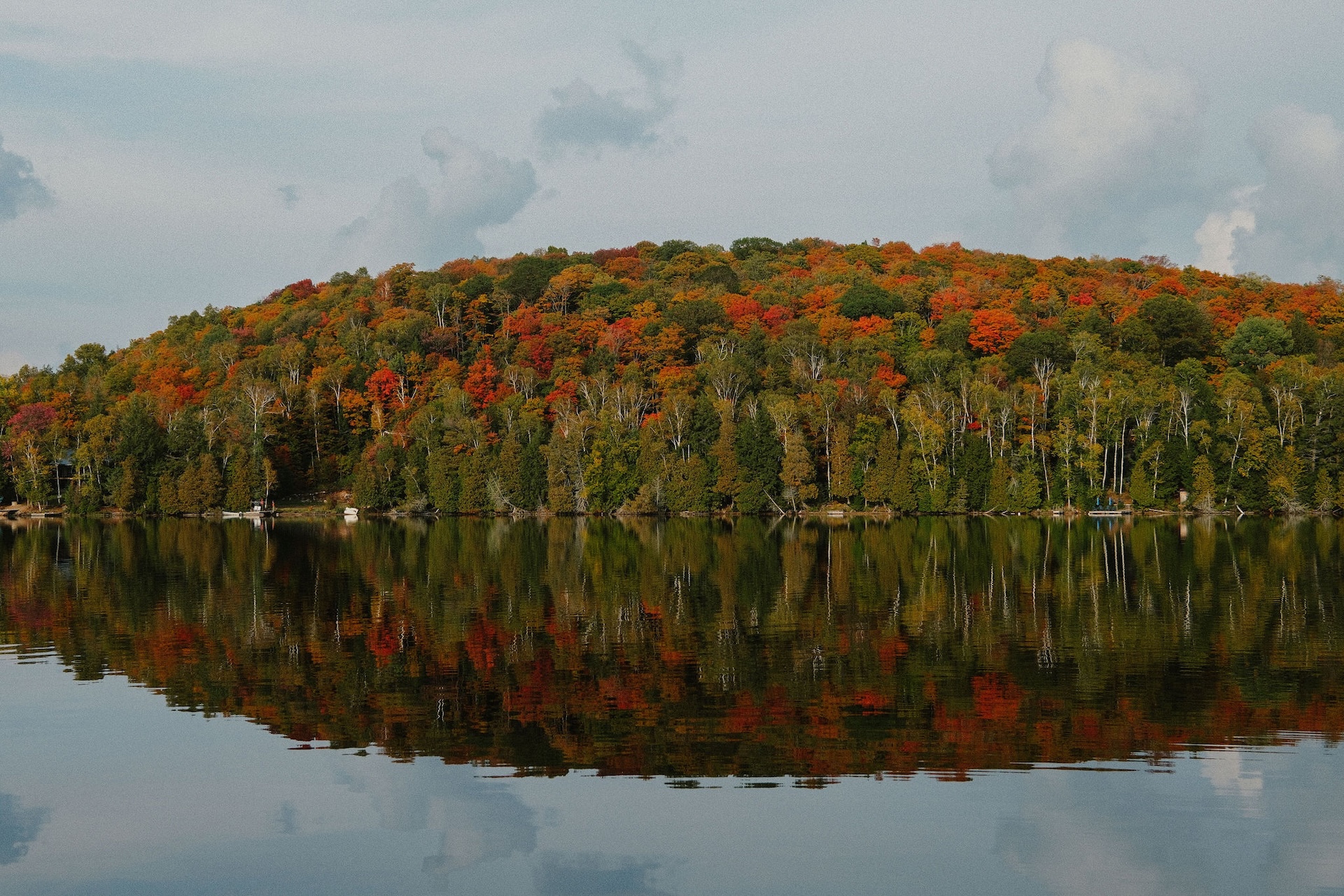 Fall foliage reflected in the calm lake